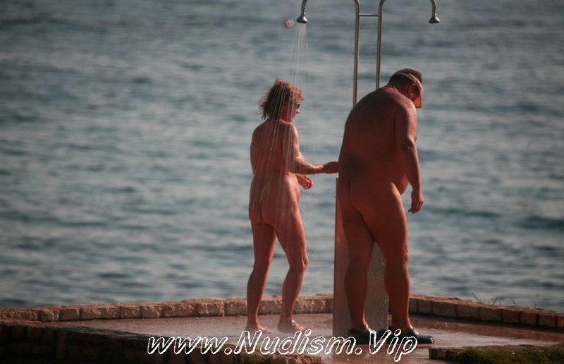 [Image: Pure-Nudism-Pics-Naturist-Shower-at-Dusk-2.jpg]